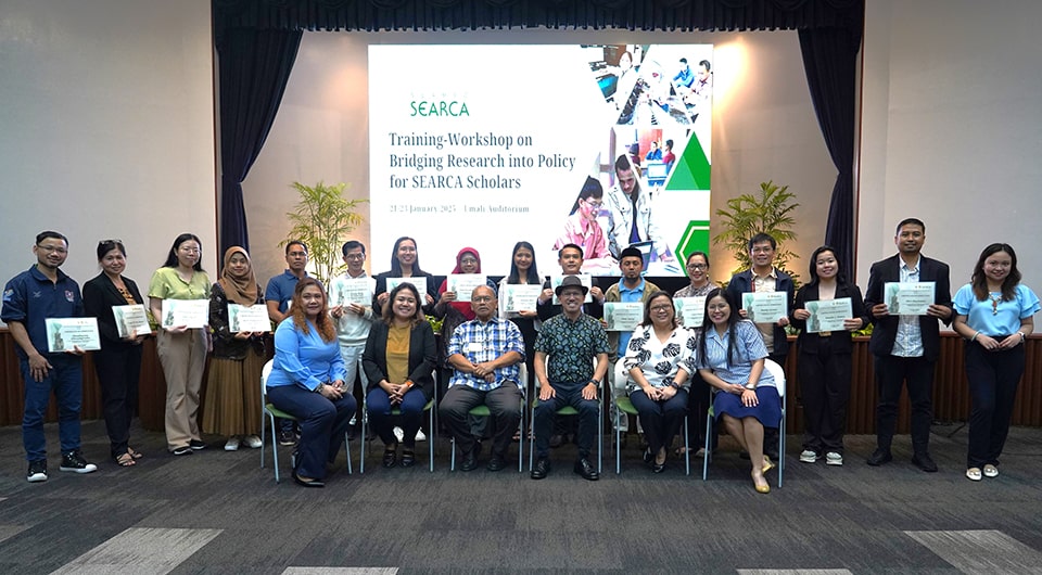 Participants and Resource Persons of the Training Workshop on Bridging Research into Policy together with the Education and Collective Learning Department and Office of the Director.