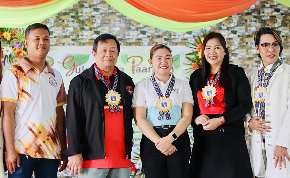 Ms. Anna Gale Vallez, SEARCA-RTLD Program Specialist, is flanked by (L-R) Randell Redulla, PTA President of San Antonio ES, Dr. Roberto Rañola of the local government of Los Baños, Ms. Soledad Villanueva, and Mr. Armin Cabrales, both of the Department of Education.