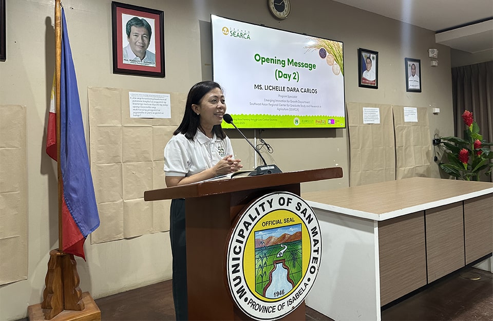 Ms. Lichelle Dara Carlos delivers her opening message, highlighting the role of rice straw management in climate mitigation.